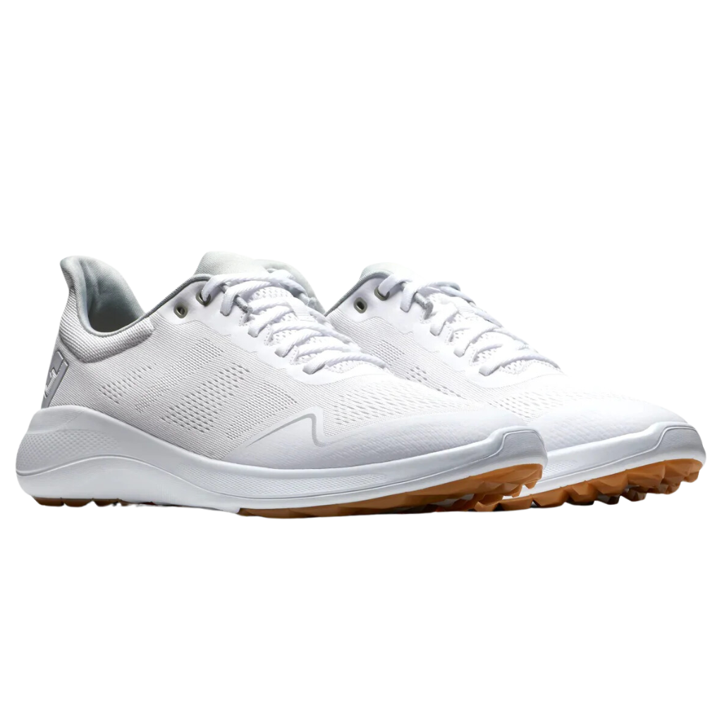 A pair of FootJoy Flex men's golf shoes in white