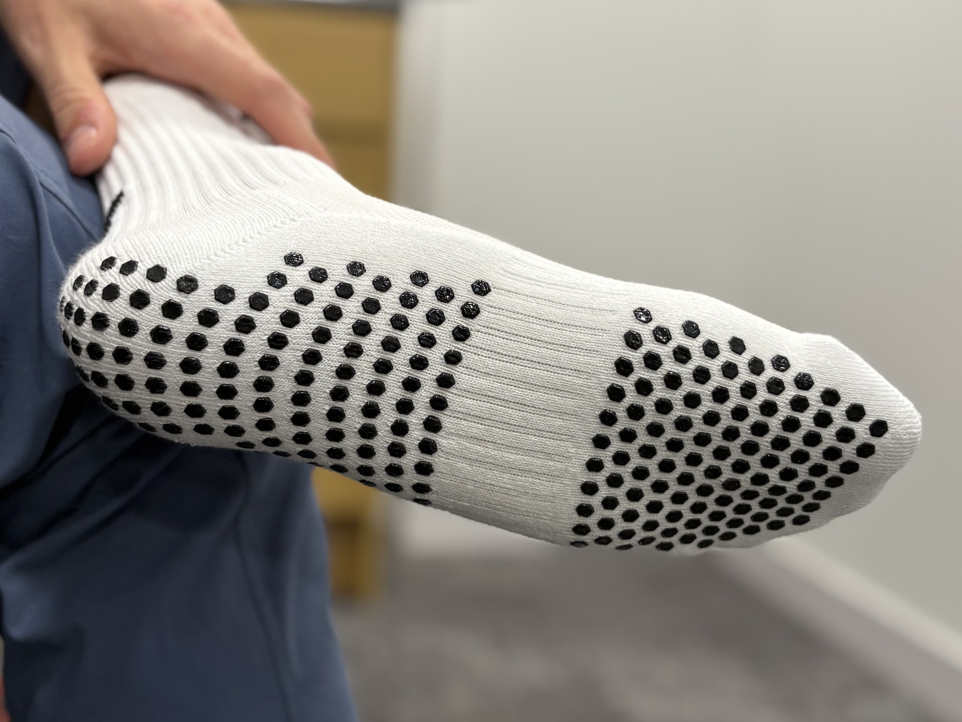 Underside of Torn golf socks.