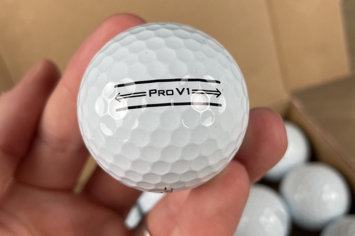 Close up of Mint grade Titleist PRO V1 Mail Order Golf lake ball