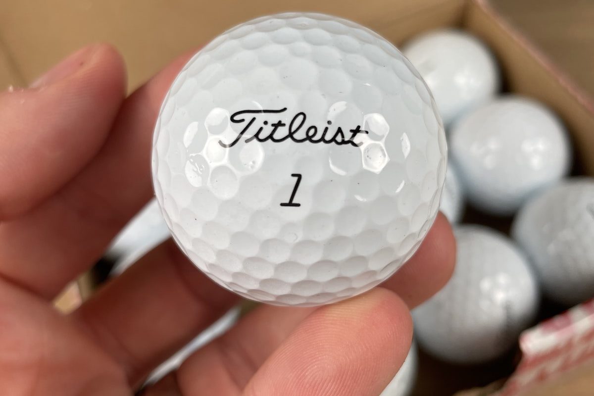 Close up of Mint grade Titleist PRO V1 Mail Order Golf lake ball.JPG